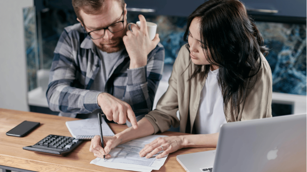 man and woman going over finances